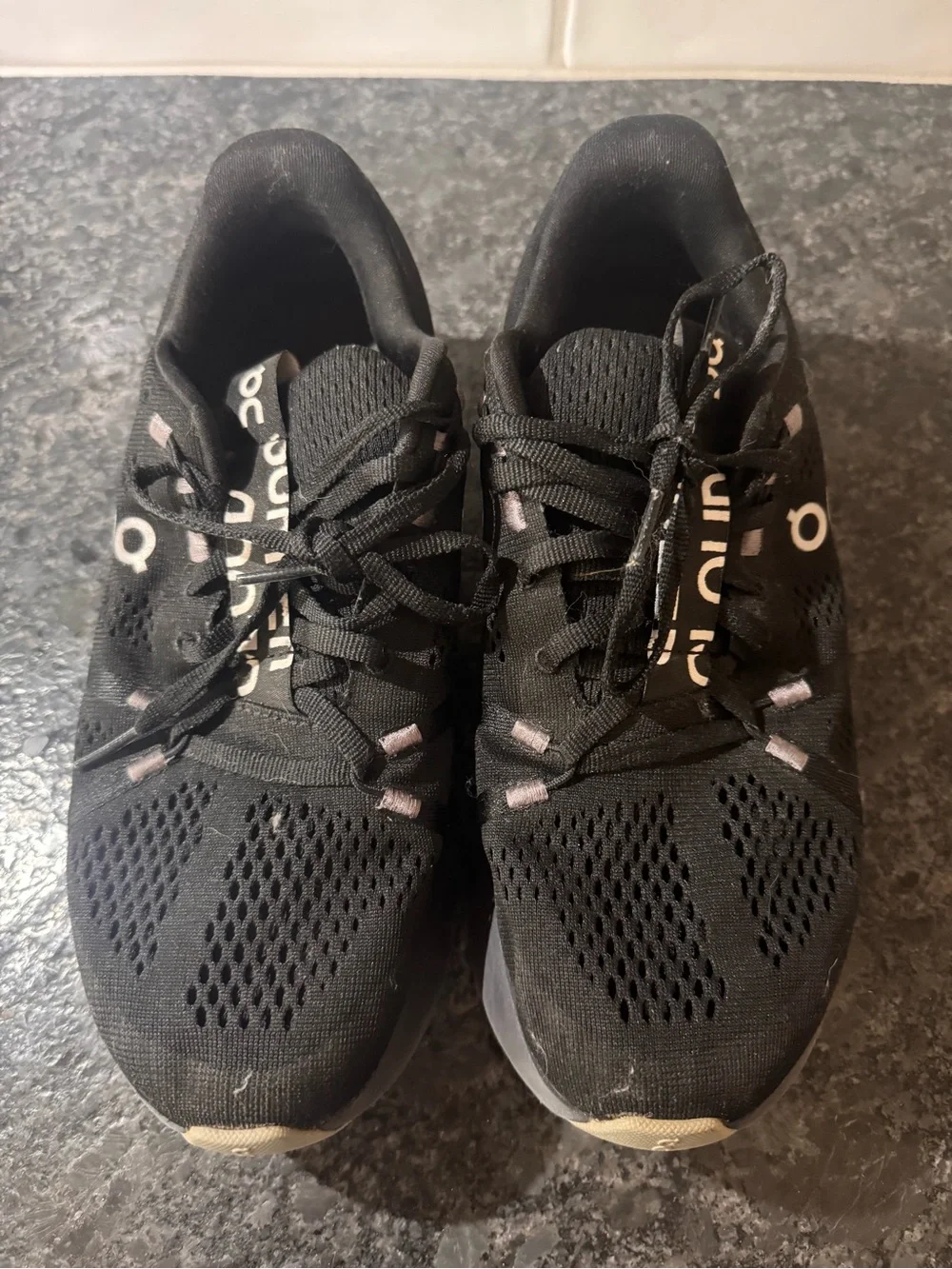 On Running Women’s Black Athletic Lace-Up Running Shoes with Subtle Pink Accents
